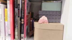 The rock mined from Choice Mate sits on a shelf amongst jewellery books.